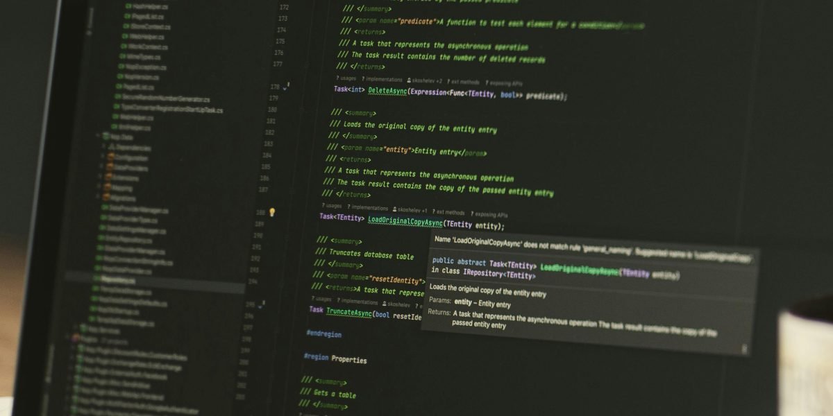 Two individuals discuss findings on a computer screen, emphasizing the importance of human collaboration and domain expertise in reviewing data analysis outputs.