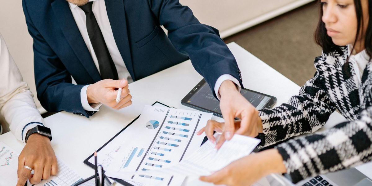 A diverse group of professionals looking confident and optimistic about their business's future.