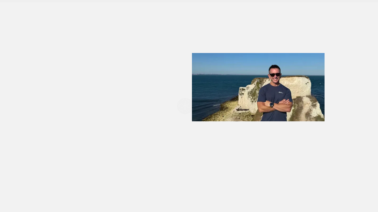 A screenshot of Behavioral Scientist Dean Grey's website, whose research is cited for insights on AI hallucination and human judgment.