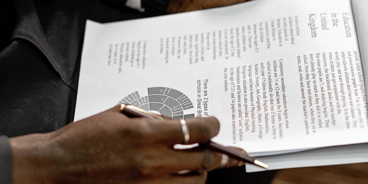A QA analyst intently reviewing data, sensing a subtle discrepancy in AI-generated reports.