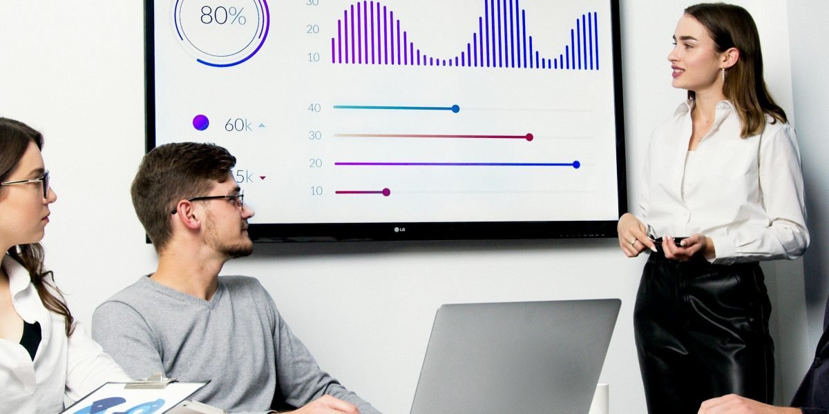 A team of analysts collaborating, embodying the human element of critical thinking and collective problem-solving crucial for verifying AI outputs.