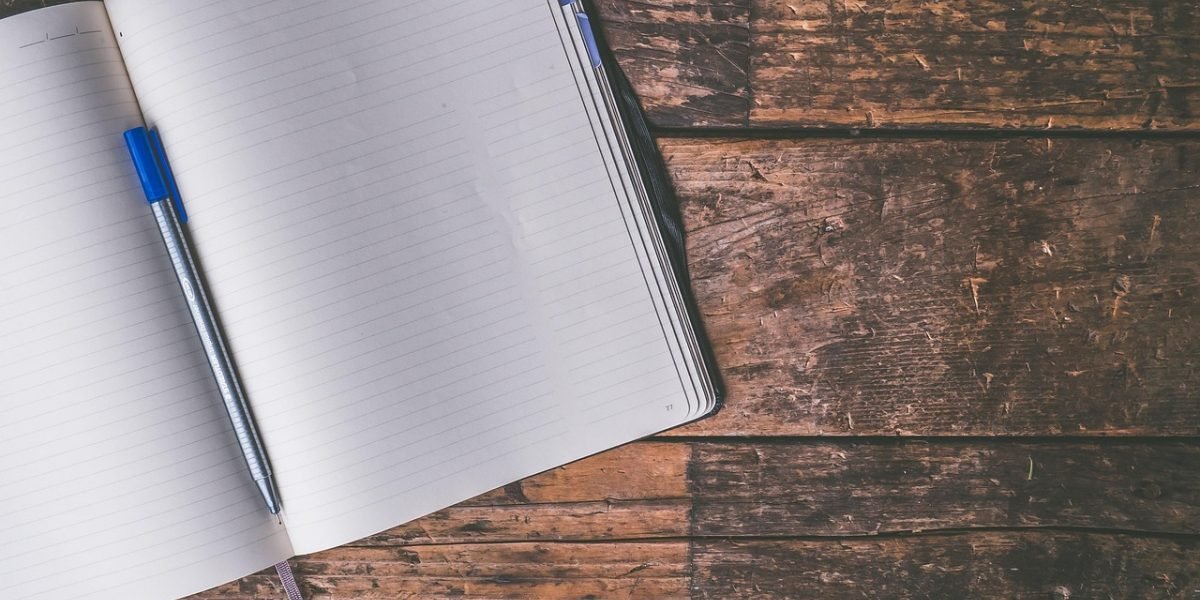 An individual meticulously reviewing documents, symbolizing the critical 'never trust, always verify' principle for AI outputs.