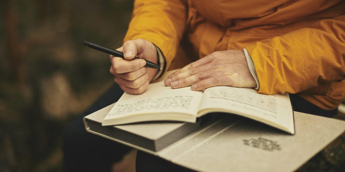 A person deeply engrossed in a document, perhaps feeling a sense of doubt or concern over information presented.