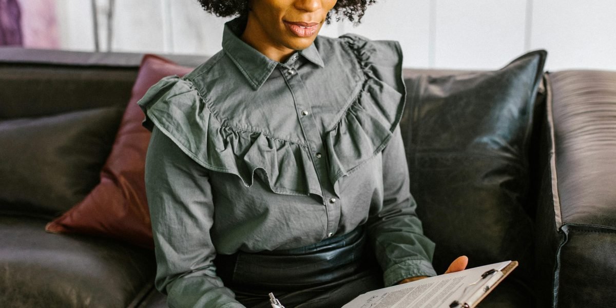 A confident person engaged in a job interview, illustrating the final stage of the hiring process for a cybersecurity analyst.