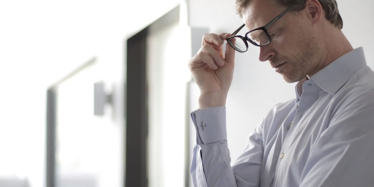 A professional confidently making a decision, symbolizing the decisive nature of prescriptive analytics.