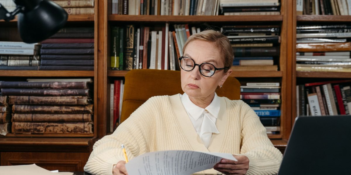 A researcher meticulously checking documents, emphasizing the importance of verifying AI-generated citations.