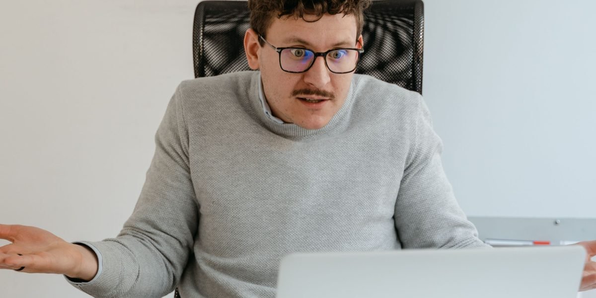 A person looks critically at information, symbolizing the need to verify AI-generated content in study materials.