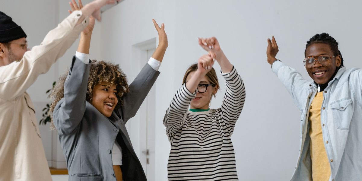 Marketing teams celebrating significant improvements in ad spend efficiency and return on investment after implementing AI accuracy fixes.