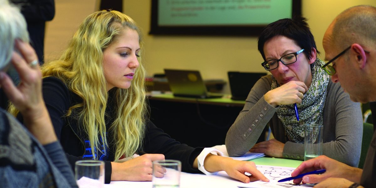 A team collaborates, outlining strategies to effectively integrate AI while managing potential risks.
